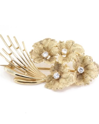 Brooch in 14 K yellow gold flowers with zircons, 1369.