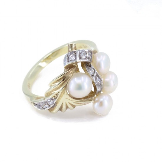 Ring in 14 K gold with four pearls and zircons, 1428.