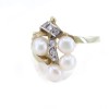 Ring in 14 K gold with four pearls and zircons, 1428.