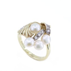 Ring in 14 K gold with four pearls and zircons, 1428.