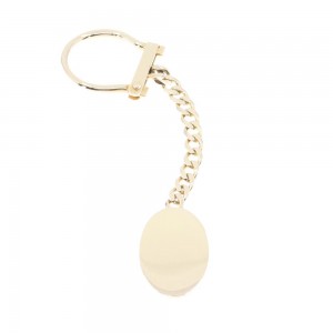 Keychain in 14 K yellow luster gold, oval, 1820.