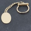 Keychain in 14 K yellow luster gold, oval, 1820.