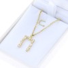 Monogram necklace excite, silver goldplated, 1996.