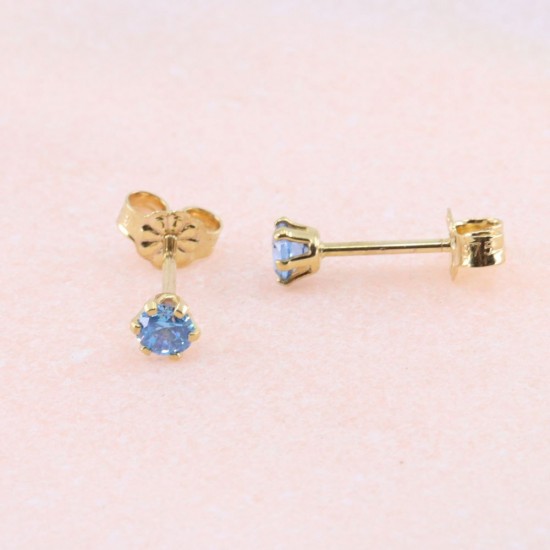 One stone earrings in 9 K gold with zircon in light blue, 2134.