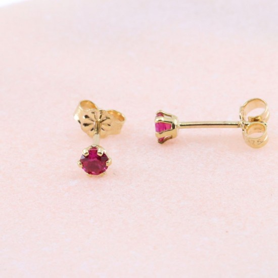 One stone earrings in 9 K gold with red zircon, 2135.