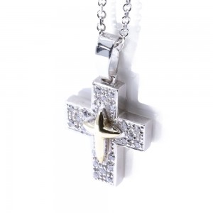 14 K cross in white gold with details in yellow and zircon, 2255.