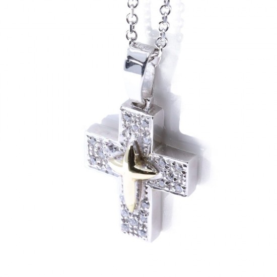 14 K cross in white gold with details in yellow and zircon, 2255.