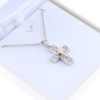 14 K cross in white gold with details in yellow and zircon, 2255.