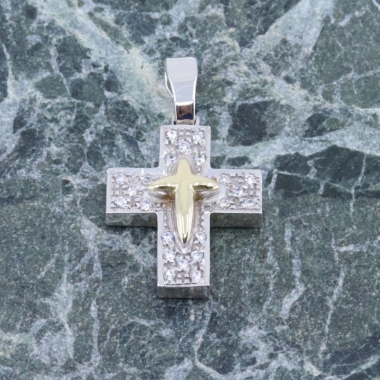 14 K cross in white gold with details in yellow and zircon, 2255.