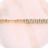 14 K yellow gold braided design hand chain, 22995.