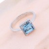 Δαχτυλίδι ροζέτα 14 Κ λευκός χρυσός με blue topaz και zircon, 2399.